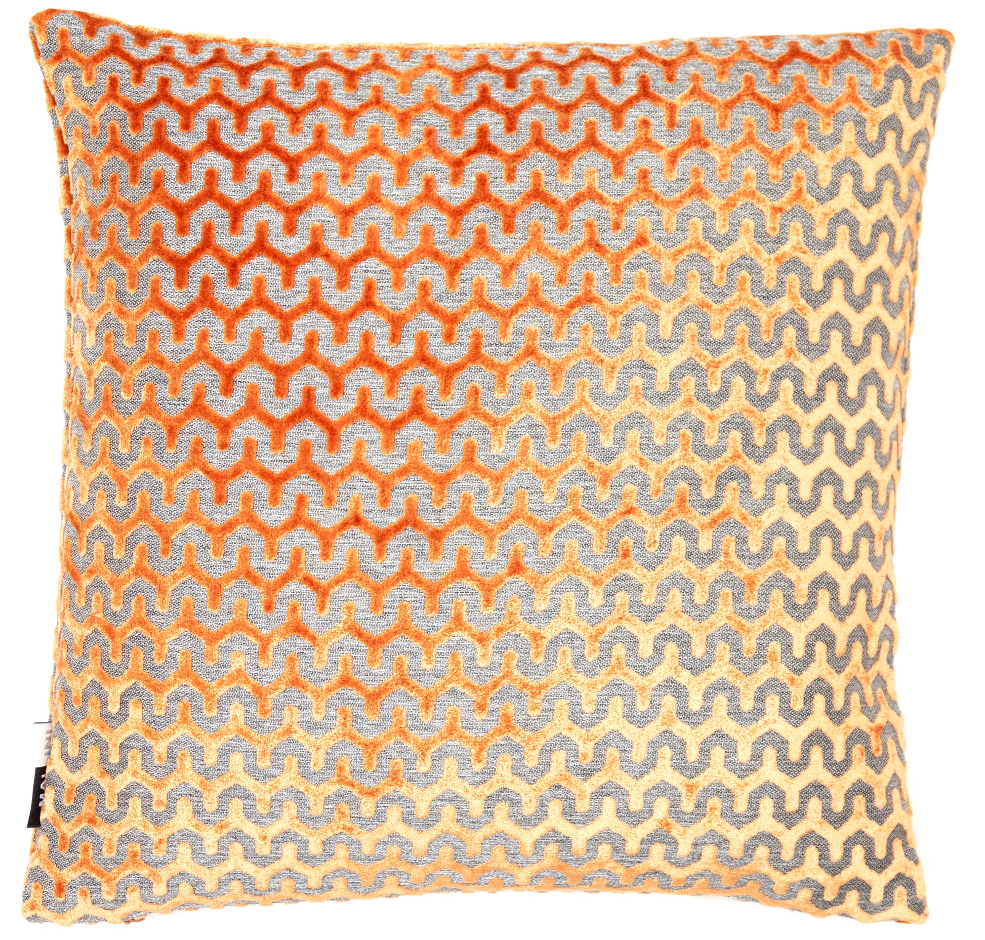 A square cushion from Malini at Vinegar Hill,  shiny tan velvet is cut through with a grey woven wavy line which has a geometric style, the outer curve is formed by two straight edges.