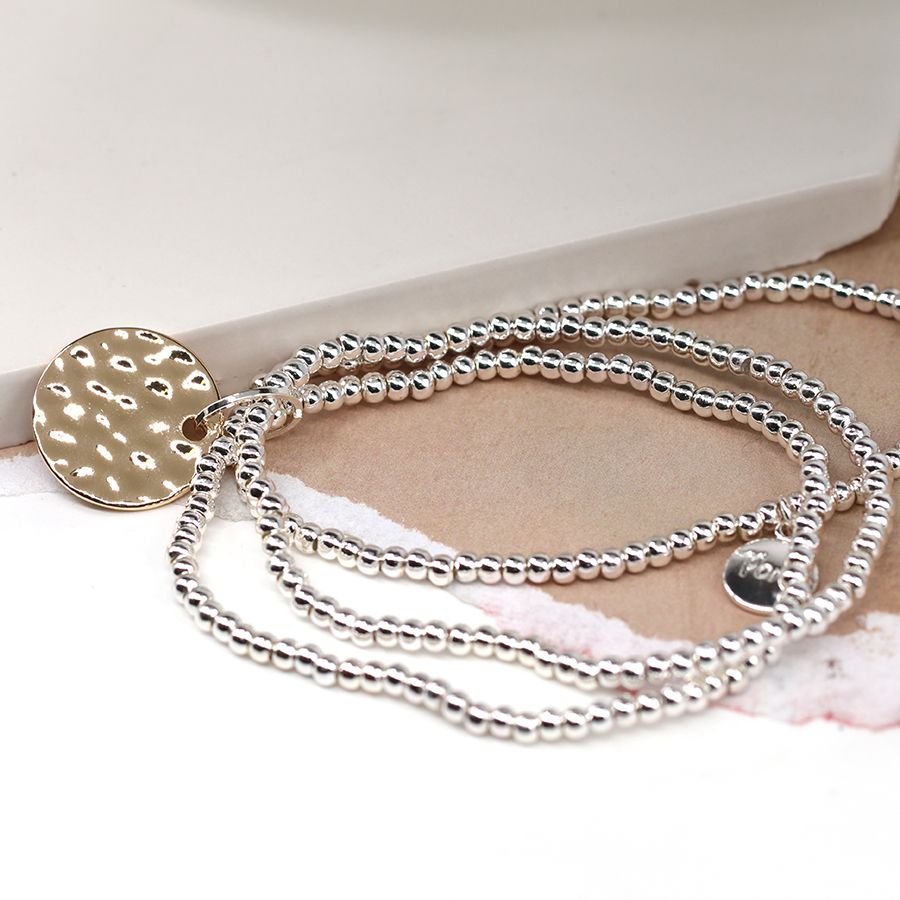 Silver Plated Triple Strand Bracelet With Golden Disc