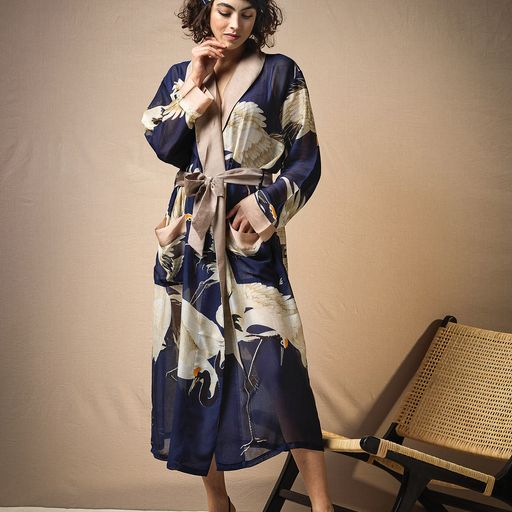 Standing model wearing the gown - front view